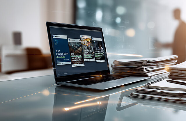 Eine moderne Illustration zum Thema "Pressearbeit". Auf einem Tisch sind ein geöffneter Laptop und mehrere Stapel mit Unterlagen zu sehen.